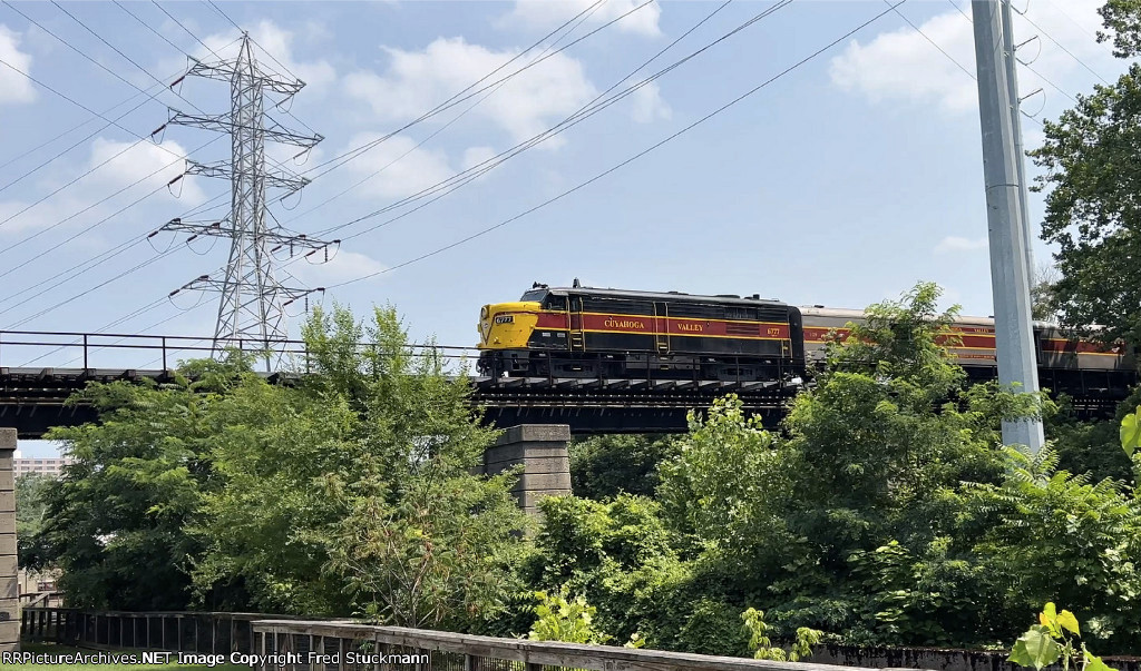 From the other side of the bridge, we see the 6777 heading north,